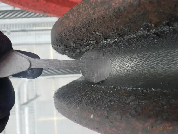 Sheave groove gauge checking a crane sheave groove